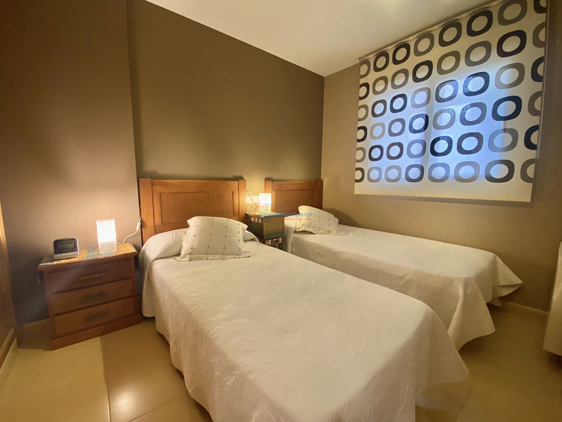 Gelijkvloers appartement met 3 slaapkamers en privé tuin - DroomHuisSpanje