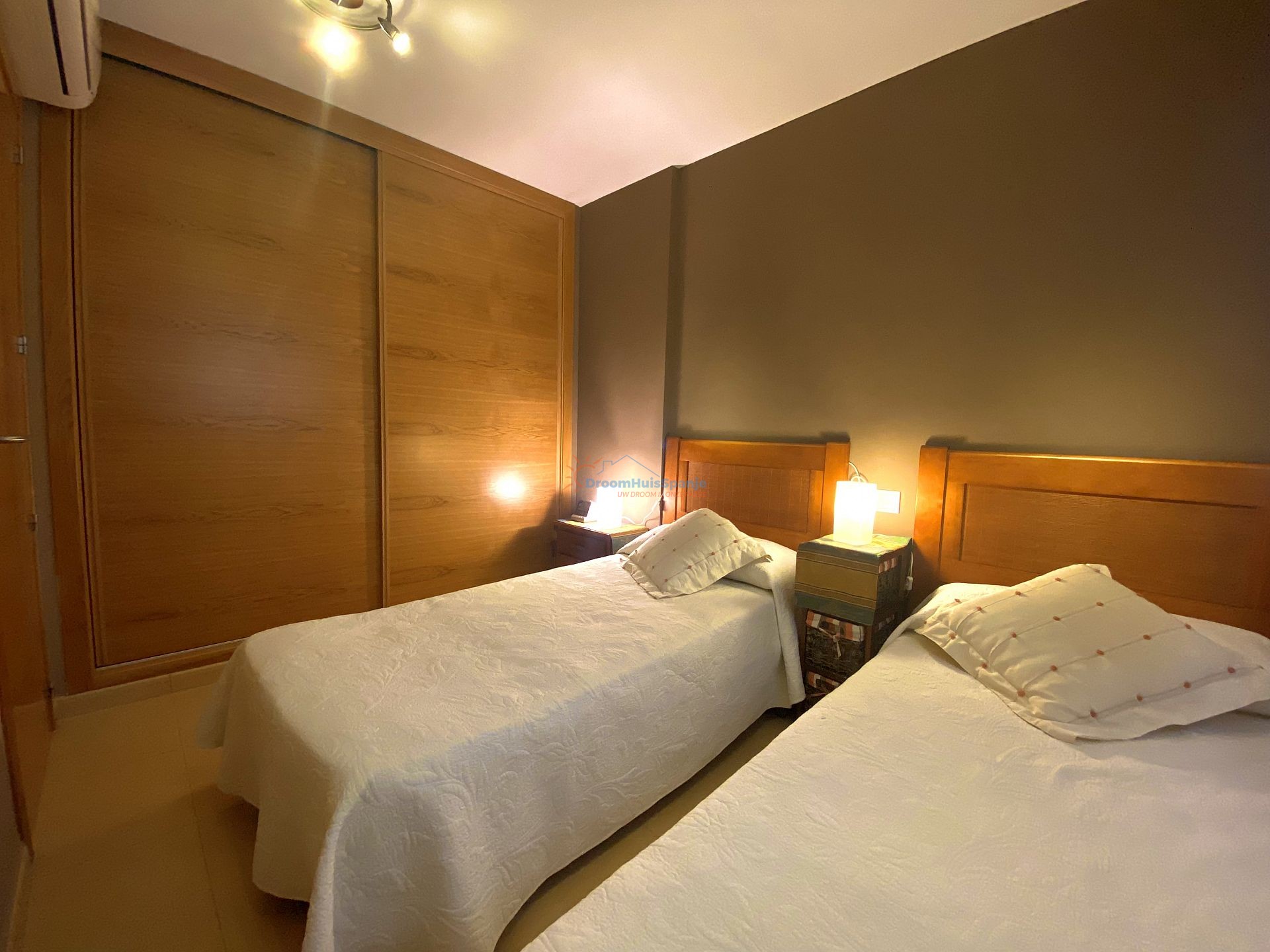 Gelijkvloers appartement met 3 slaapkamers en privé tuin - DroomHuisSpanje