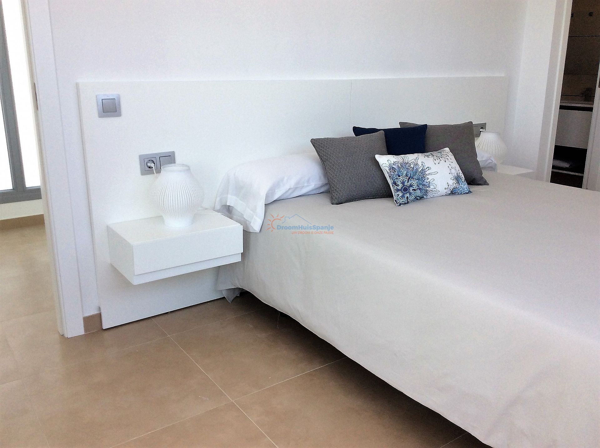 Gelijkvloerse quad villa met eigen dakterras - DroomHuisSpanje