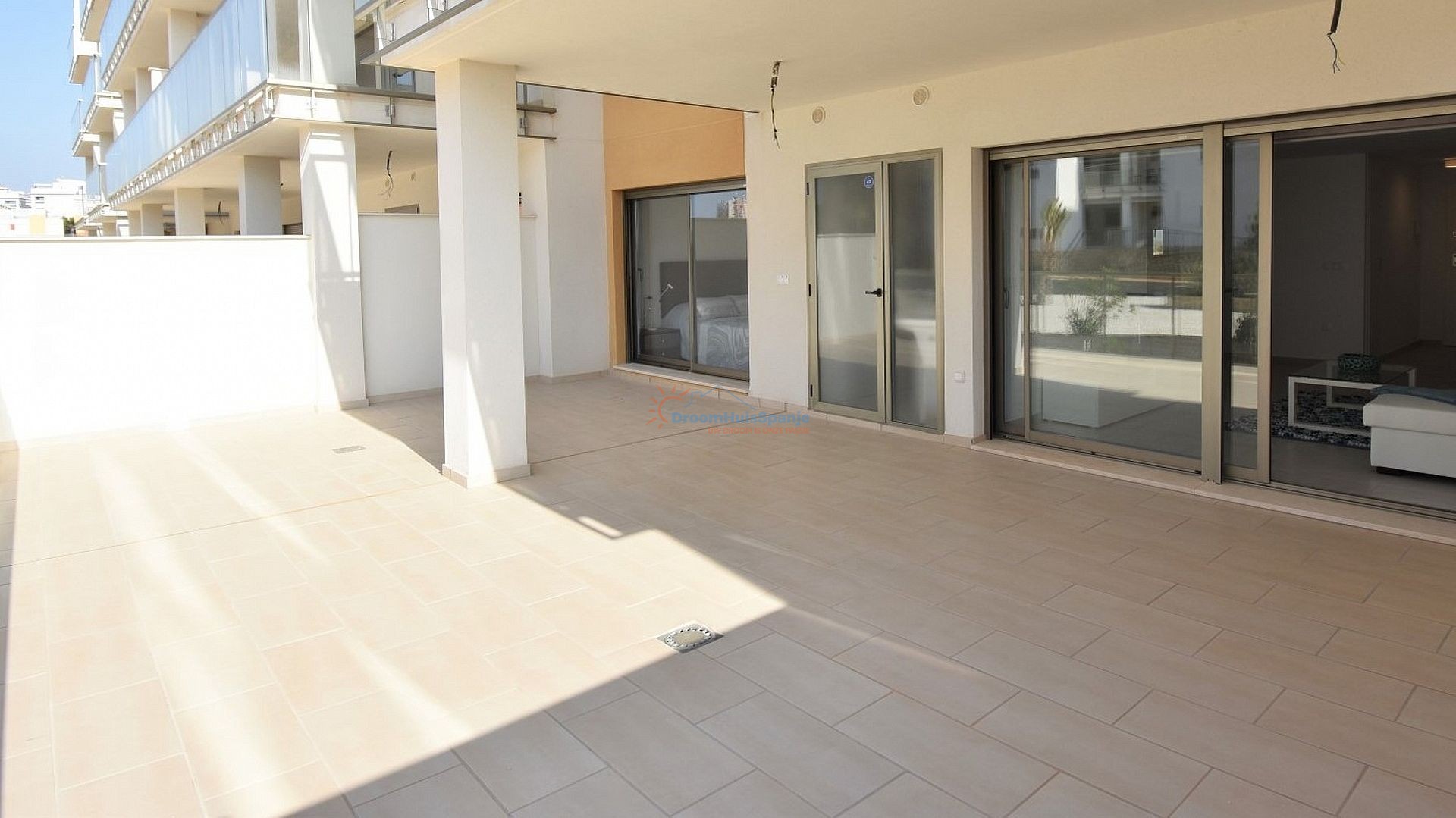 Begane grond appartement met 2 slaapkamers in Villamartin - DroomHuisSpanje